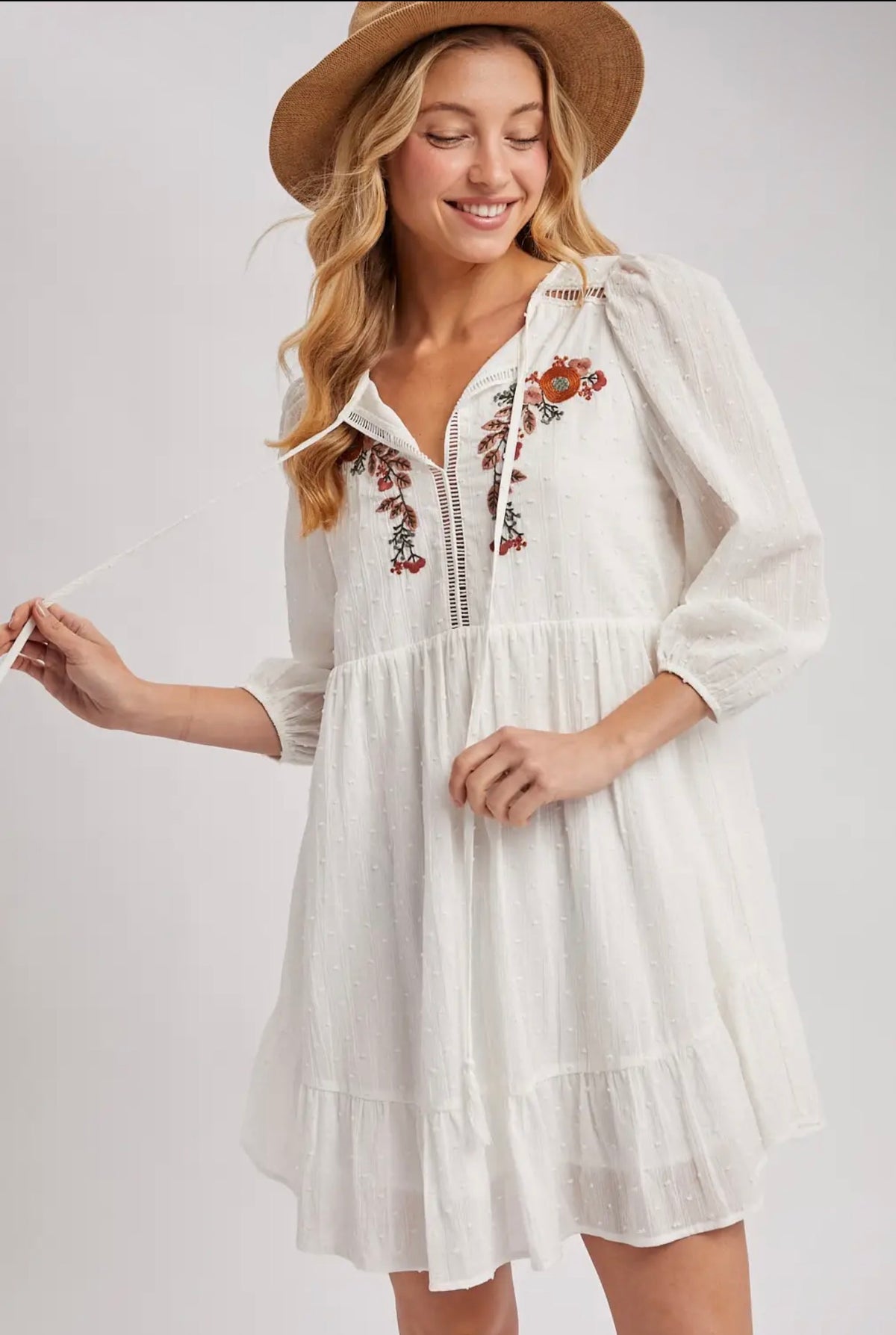 Embroidered Ruffled Baby Doll Dress.